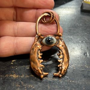 Copper Plated animal Jaw bone and Antique Glass Doll Eye.